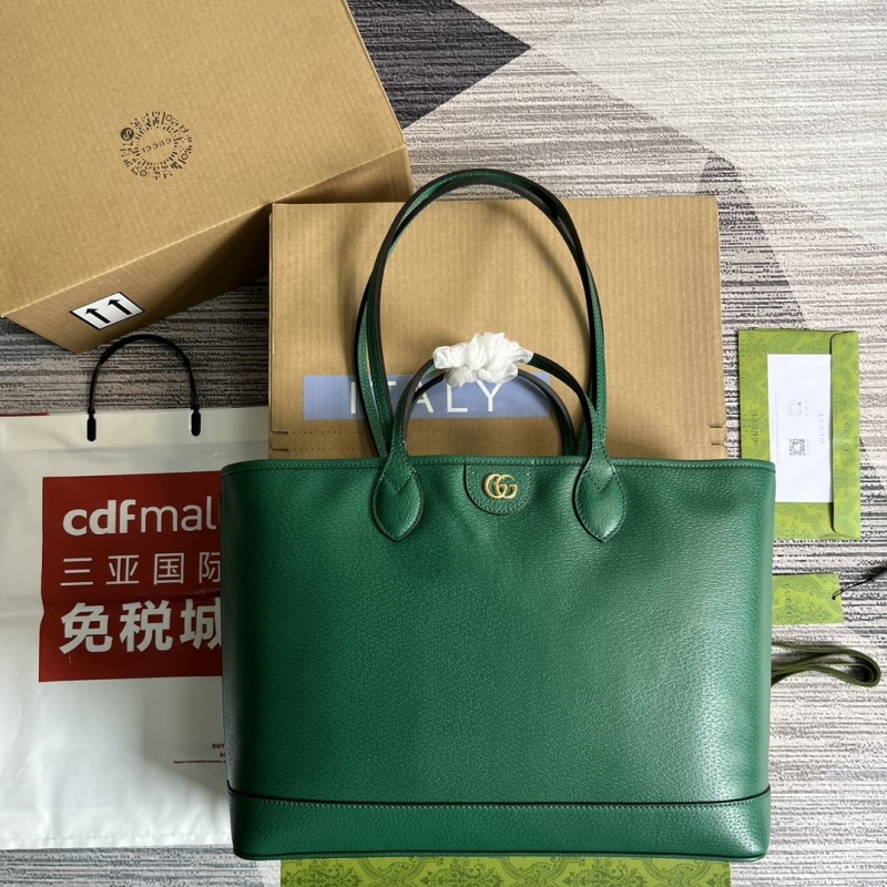 G*u*i shopping bags